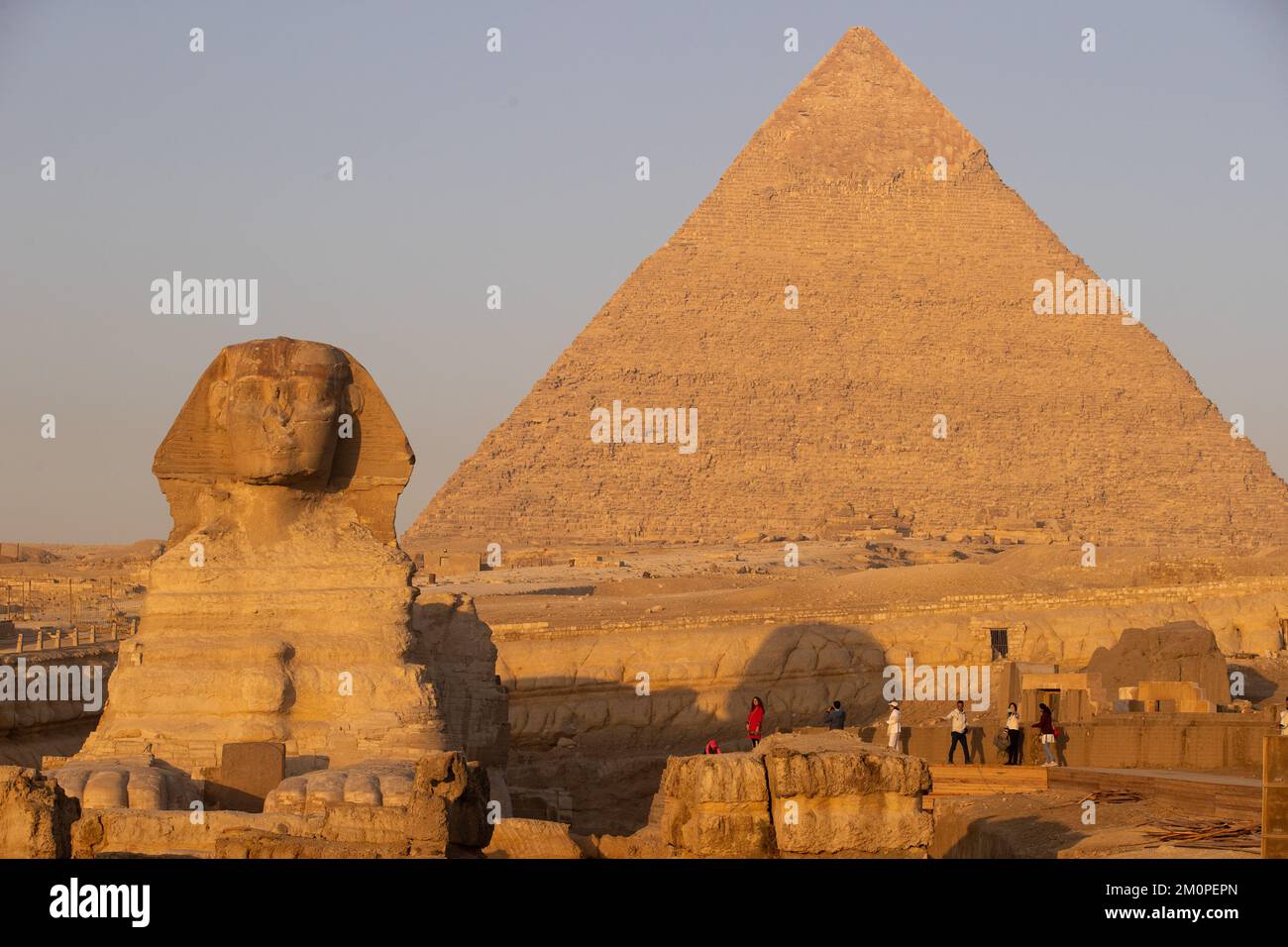 The pyramids at Giza and the Sphinx as seen in the early morning light ...