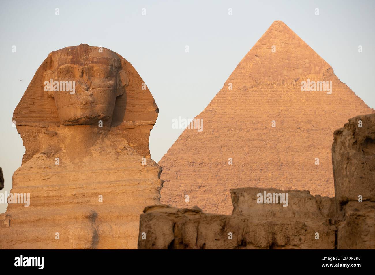 The pyramids at Giza and the Sphinx as seen in the early morning light in Cairo, Egypt Stock Photo