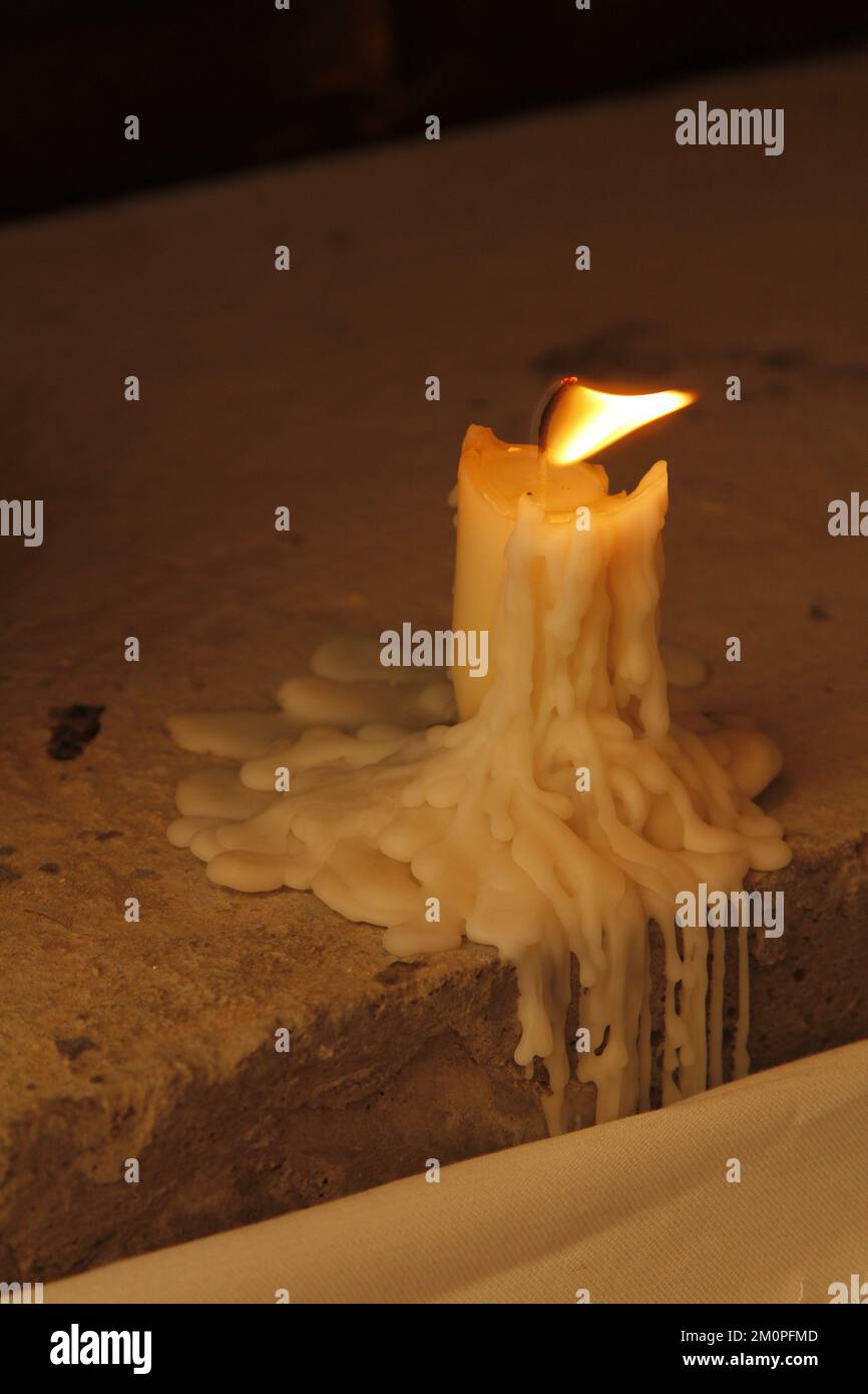 Christmas background with burning candle Stock Photo - Alamy