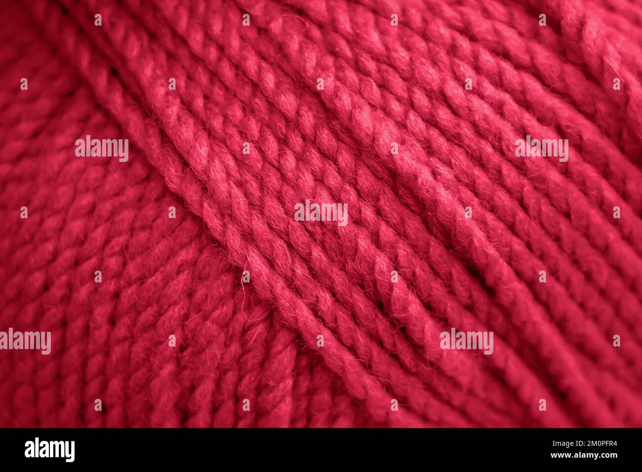 Texture of pink fluffy woolen threads for knitting closeup. Color of ...