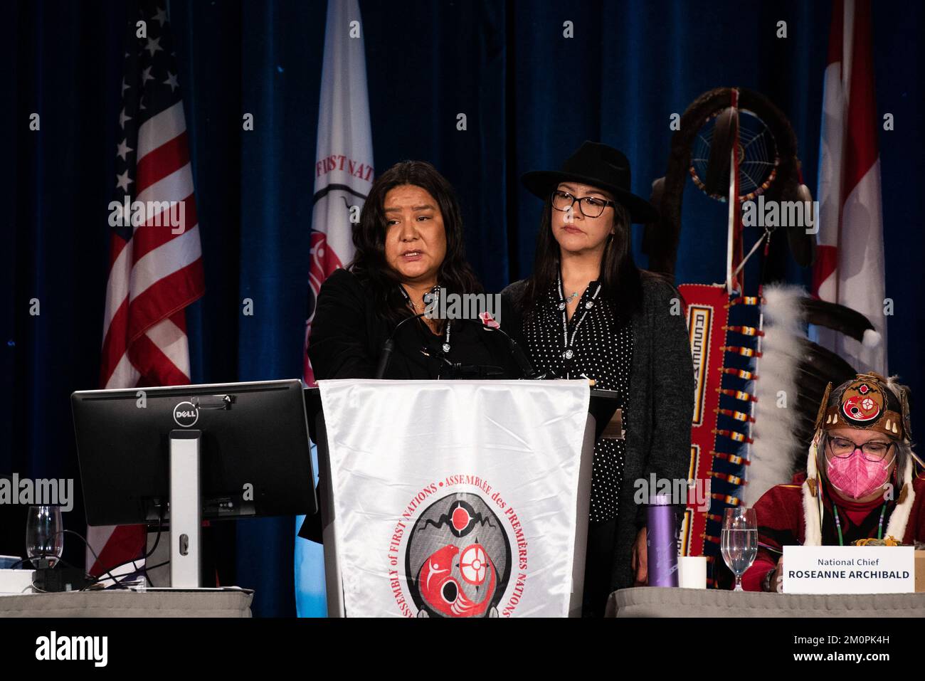 Karen Osachoff, left, speaks as Melissa Walterson stands beside her