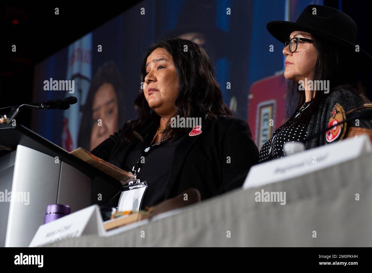 Karen Osachoff, left, speaks with as Melissa Walterson looks on during the Assembly of First