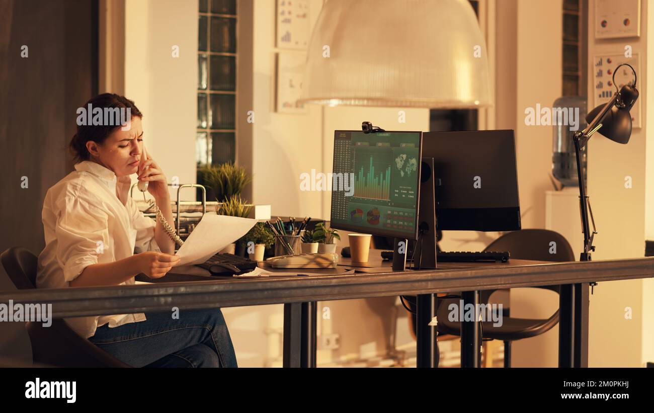 Pkhj Black female freelancer working graphs hi-res stock photography and ...