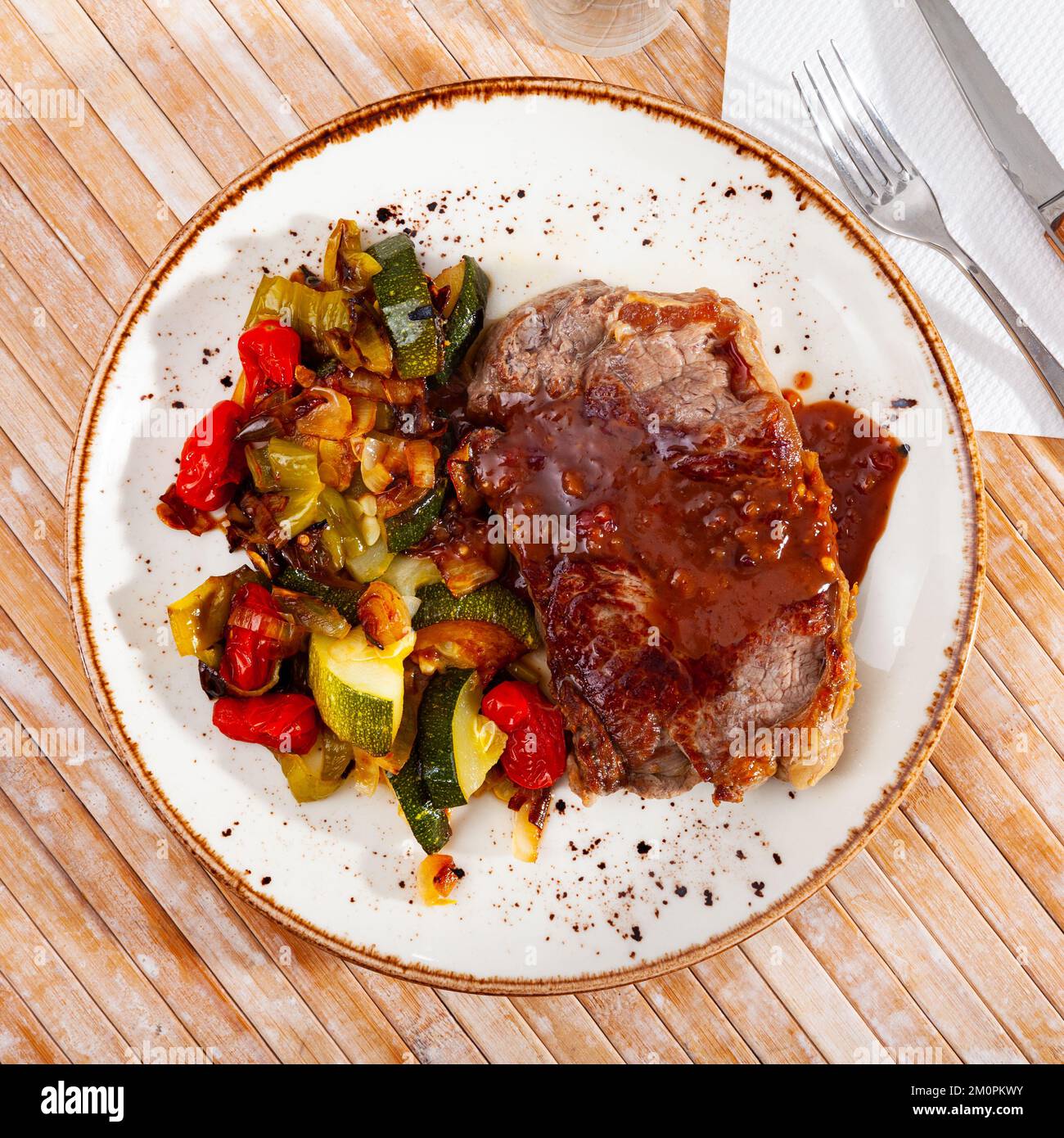 Grilled veal steak with braised vegetables Stock Photo - Alamy Grilled veal steak with braised vegetables Stock Photo - Alamy