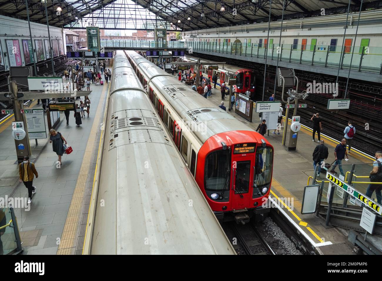 Passengers on platform at Earl's Court underground, tube station London