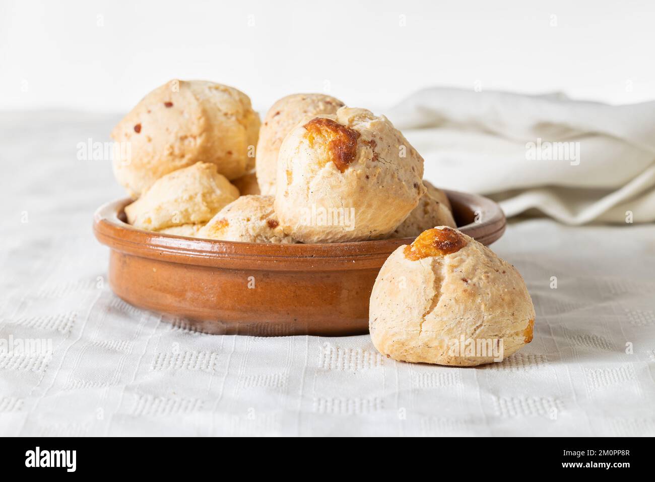 Chipa, typical Paraguayan cheese bread on white background. Stock Photo