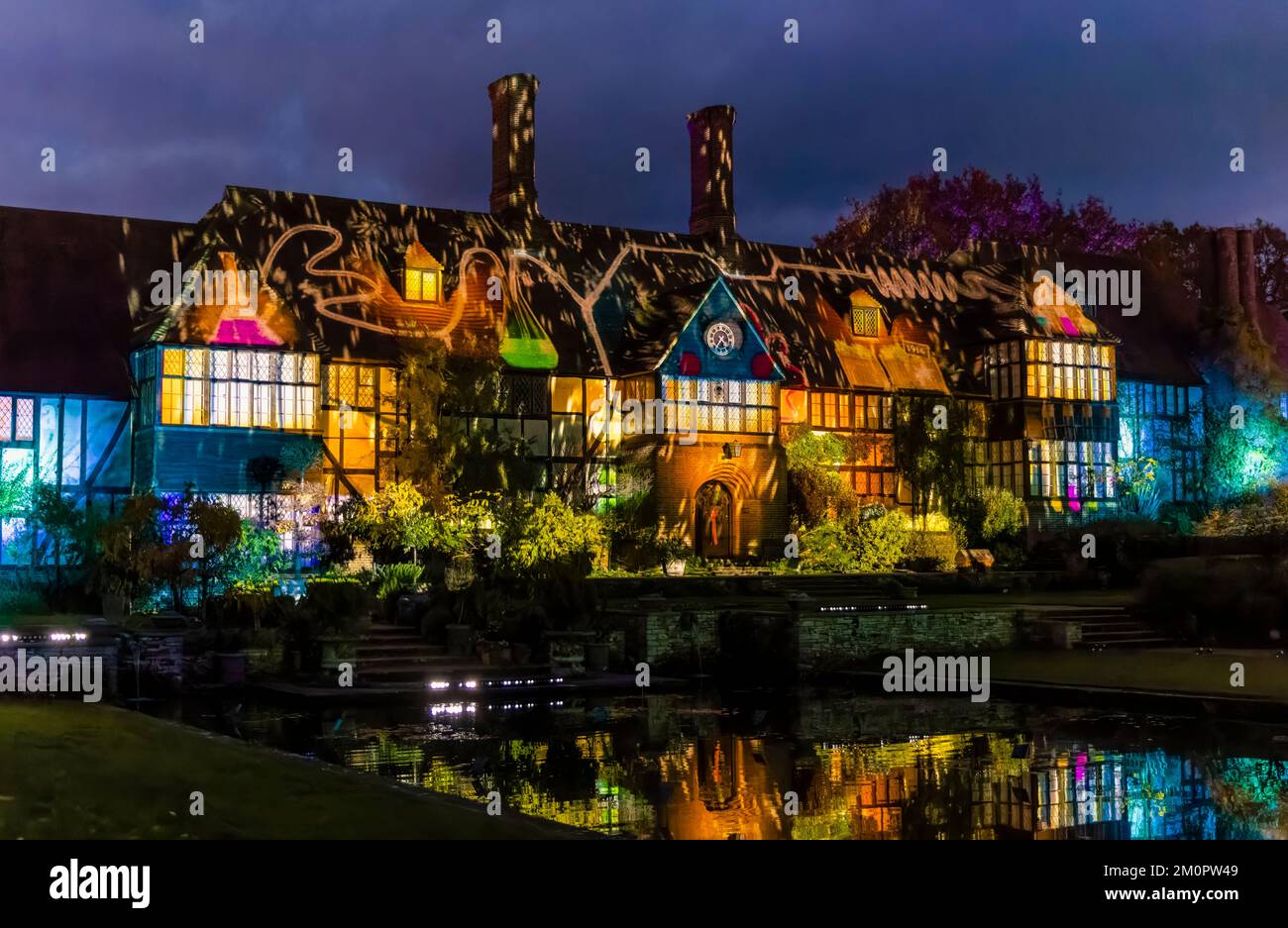 The Laboratory Building Illuminated With Colourful Lights Reflected In The Jellicoe Canal