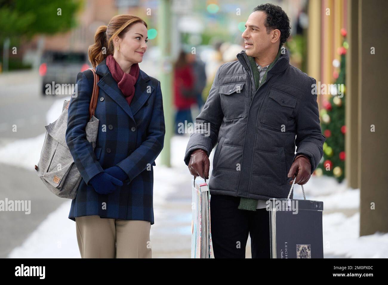 WE NEED A LITTLE CHRISTMAS, from left: Erica Durance, Patrick Sabongui ...