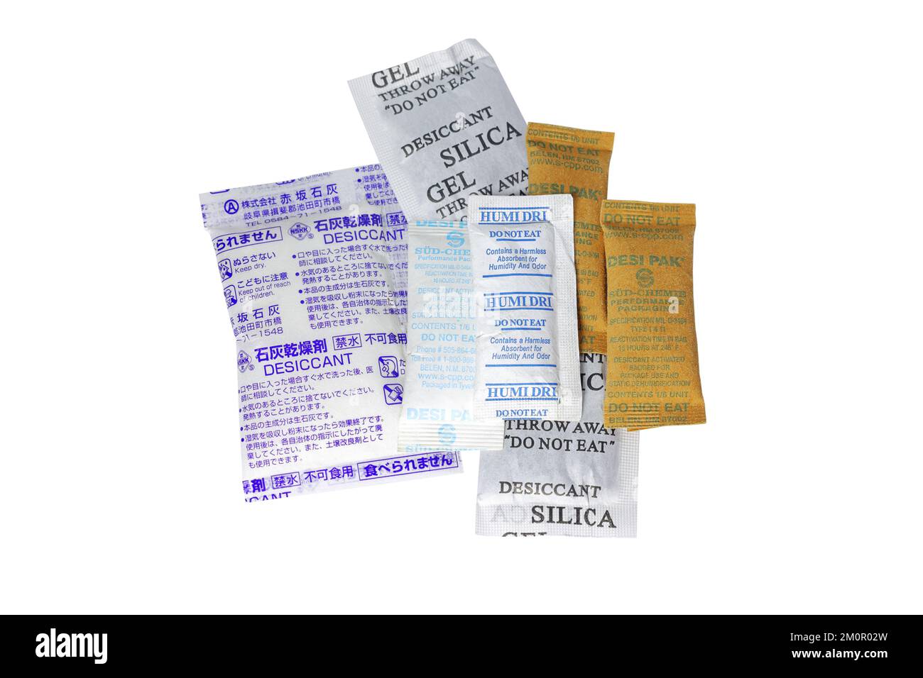 A collection of silicon dioxide, and calcium oxide desicant packets isolated on a white background. cutout image for illustration and editorial use. Stock Photo