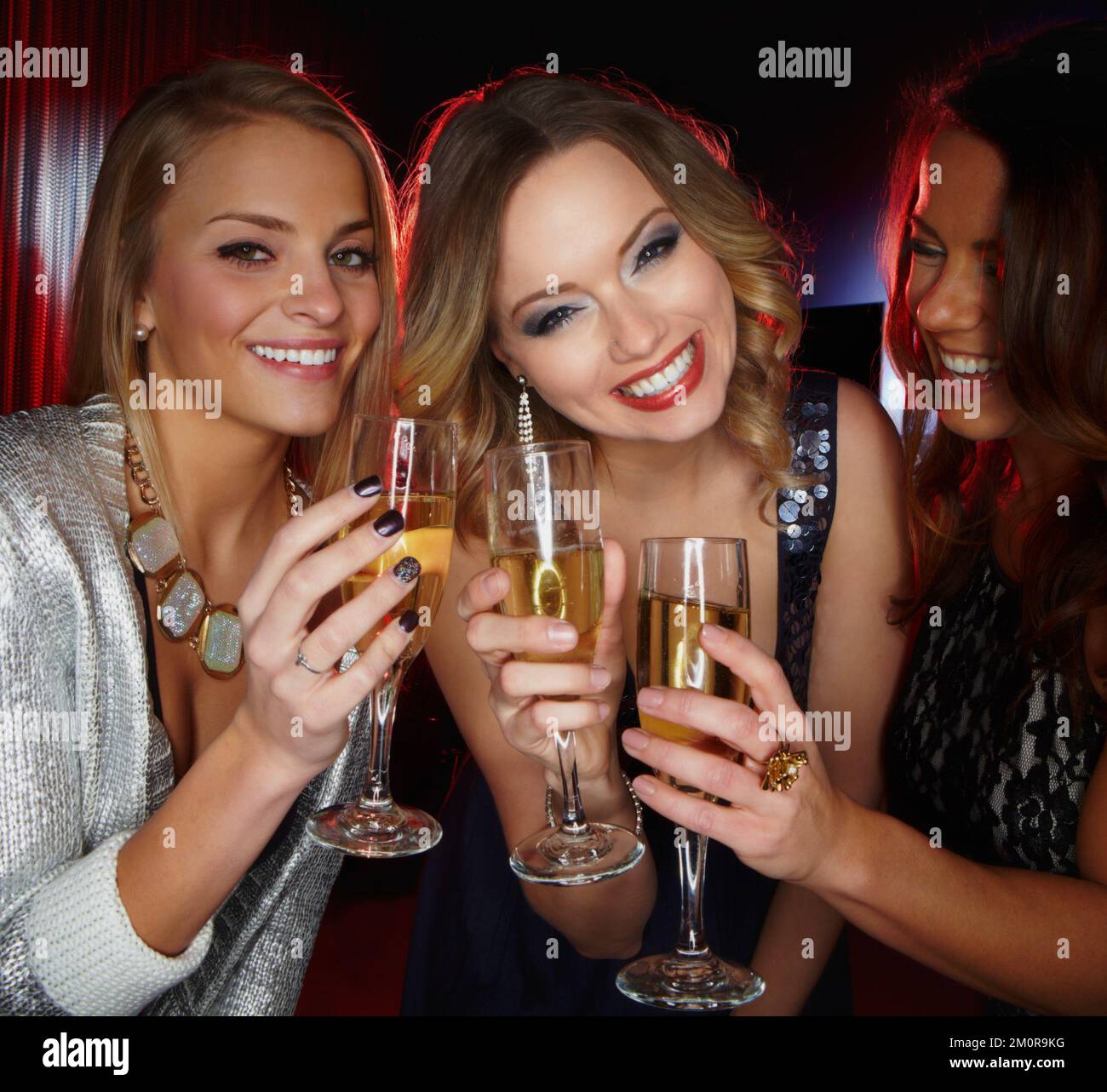 Three young women laughing smiling hi-res stock photography and images ...