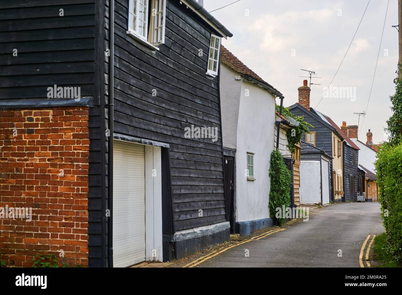 Old wooden fronted houses in a quiet country lane in Thaxted, Essex, UK Stock Photo Alamy