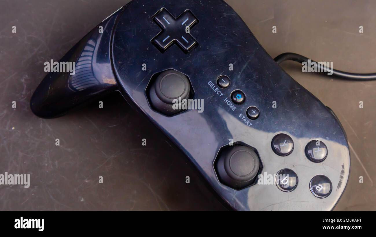 black joystick isolated on black background Stock Photo - Alamy