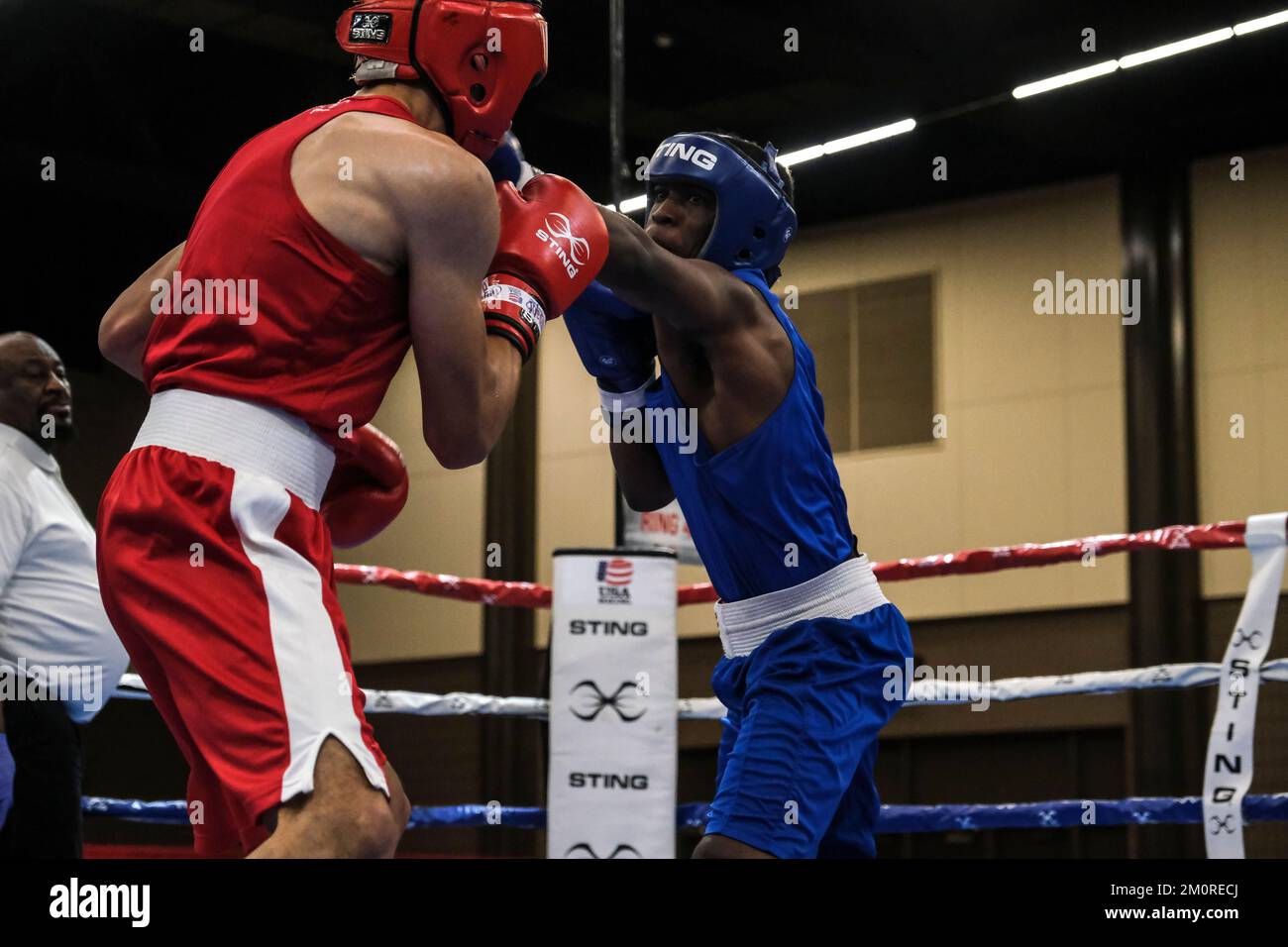 Lubbock, TX, USA. 7th Dec, 2022. Raimier Walker (blue) of Liverpool, NY in action against Cesar Olvera of Tracy, CA in an Elite Male 132lb fight. Walker was declared the winner by decision. (Credit Image: © Adam DelGiudice/ZUMA Press Wire) Stock Photo
