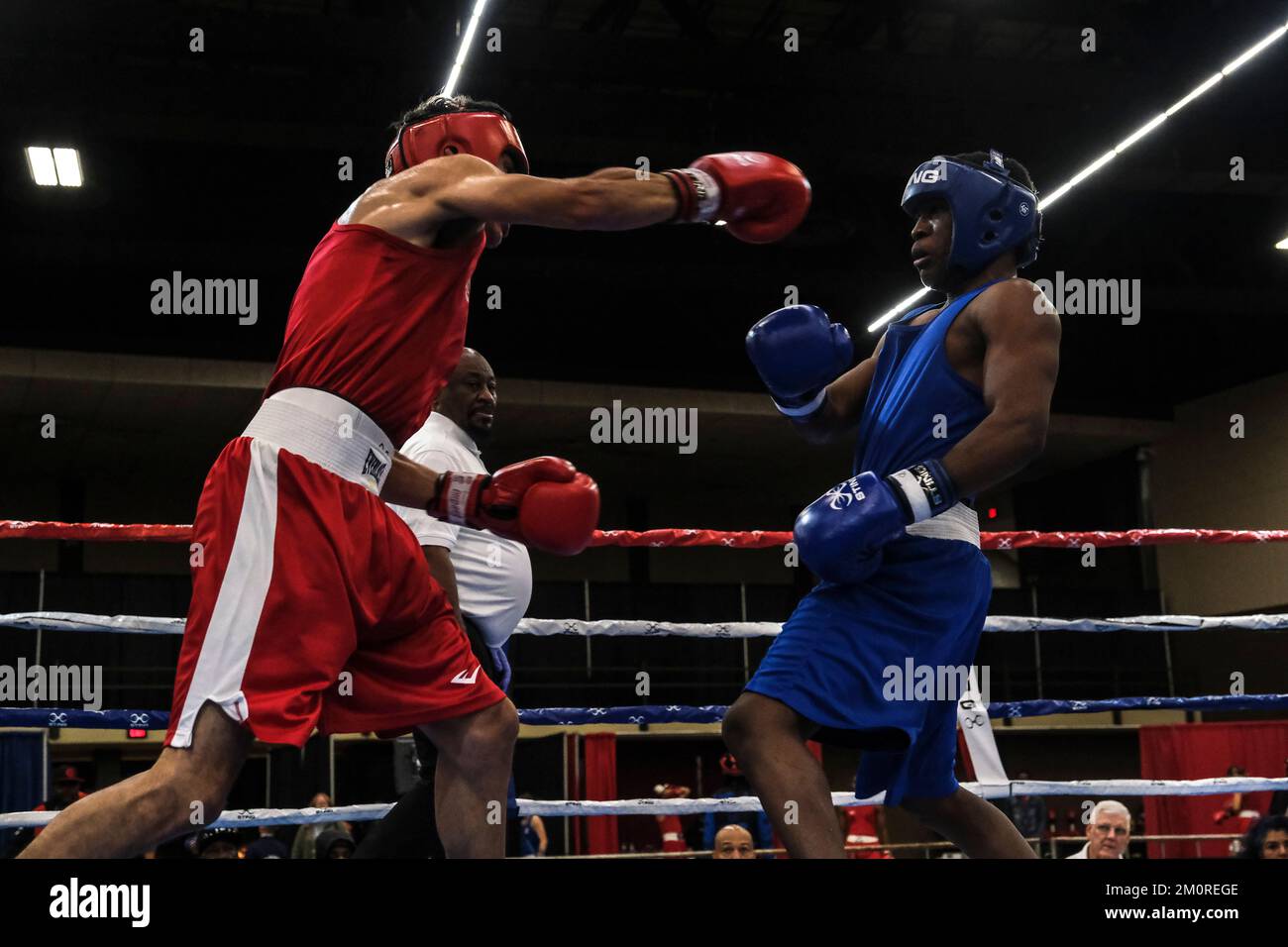 Lubbock, TX, USA. 7th Dec, 2022. Raimier Walker (blue) of Liverpool, NY in action against Cesar Olvera of Tracy, CA in an Elite Male 132lb fight. Walker was declared the winner by decision. (Credit Image: © Adam DelGiudice/ZUMA Press Wire) Stock Photo