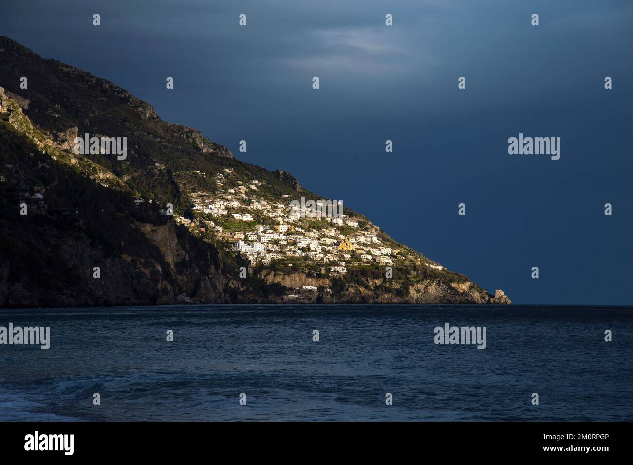 Houses on a mountain side, view from Positano Spiaggia Beach, Positano, Campania, Italy Stock Photo