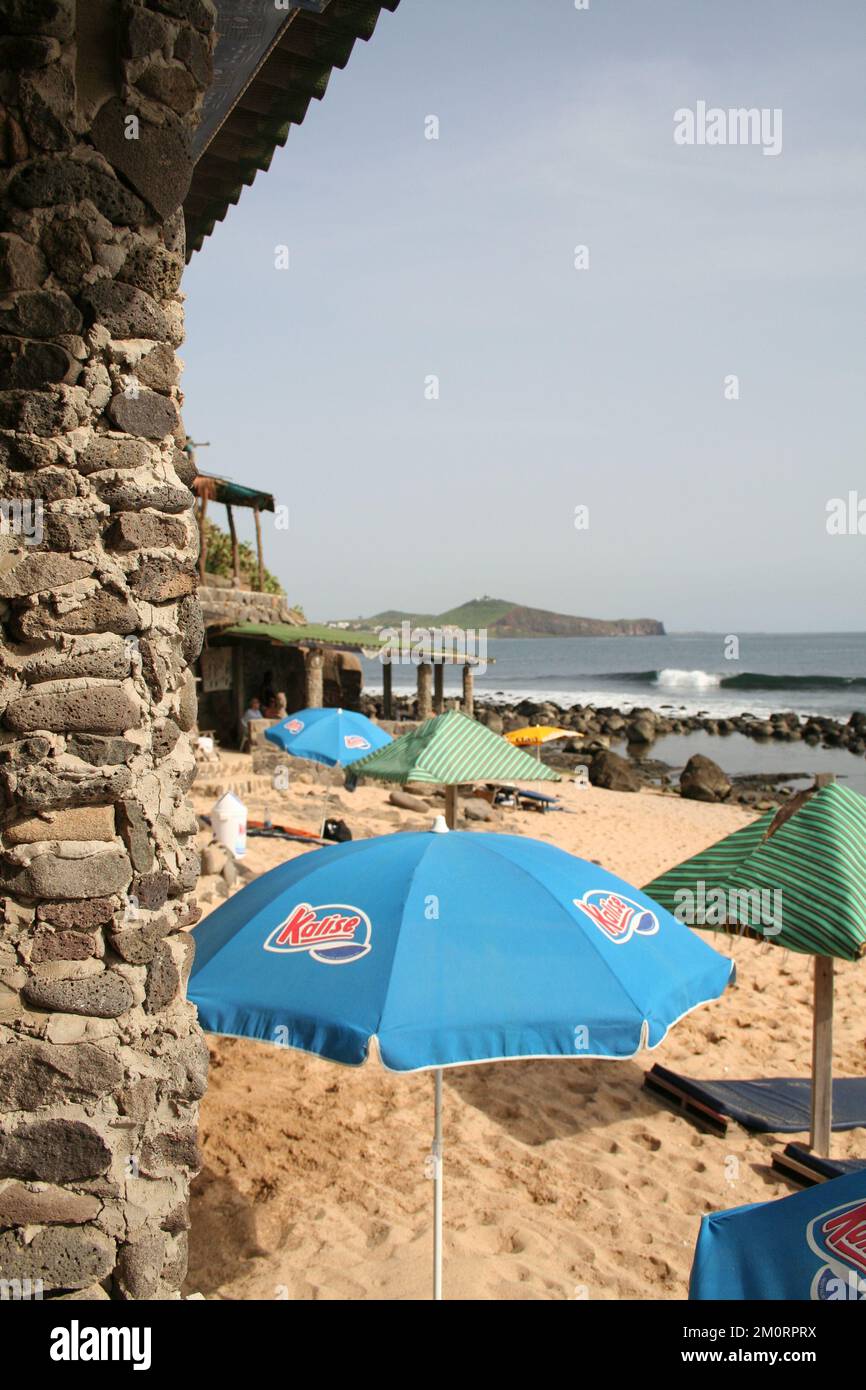 Umbrellas on the beach, N'Gor, Dakar, Senegal - pristine beach; tranquil sea; peaceful beach Stock Photo