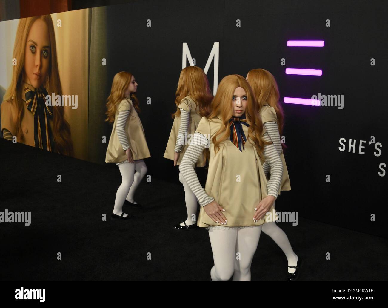 Los Angeles, United States. 07th Dec, 2022. Dancers dressed in the character of the robotic doll in the film, perform on the black carpet during the premiere of the motion picture sci-fi horror thriller M3GAN' at the TCL Theatre in the Hollywood section of Los Angeles on Wednesday, December 7, 2022. Storyline: A robotics engineer at a toy company builds a life-like doll that begins to take on a life of its own. Photo by Jim Ruymen/UPI Credit: UPI/Alamy Live News Stock Photo
