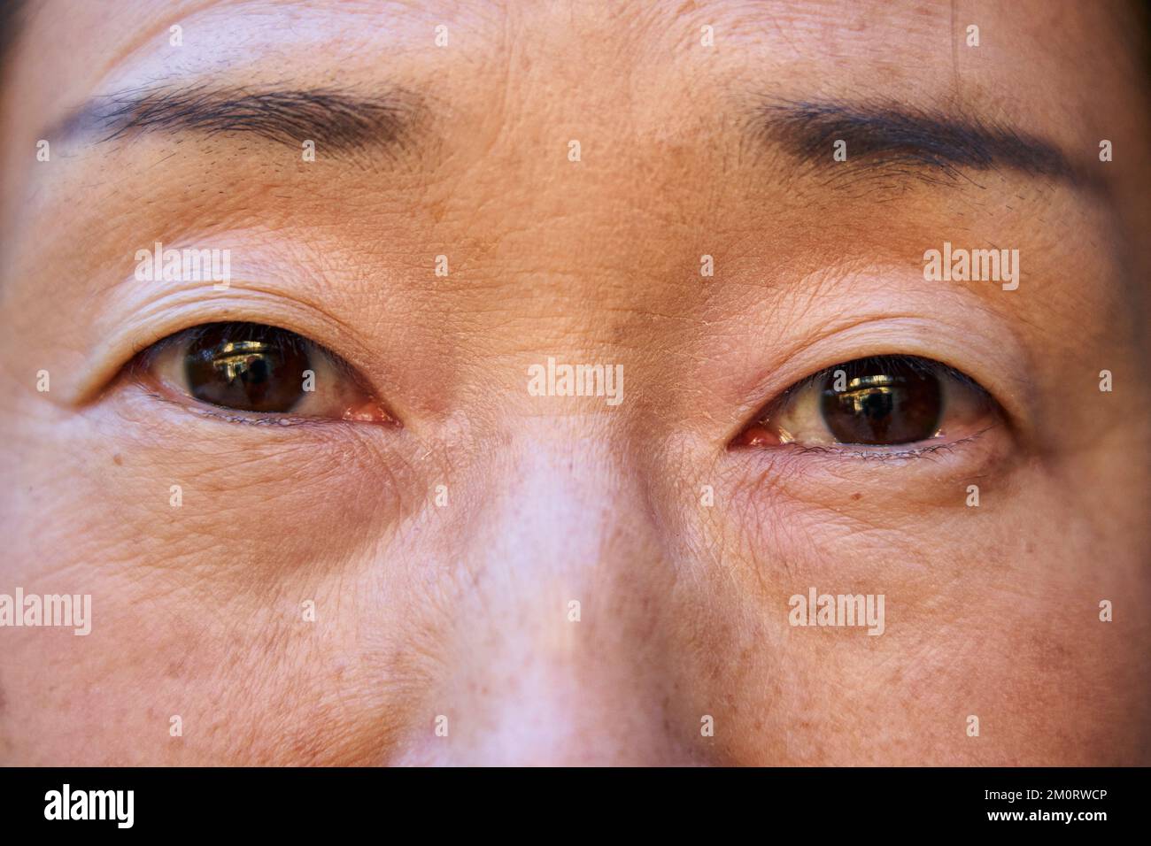 Asian womans eyes hi-res stock photography and images - Alamy