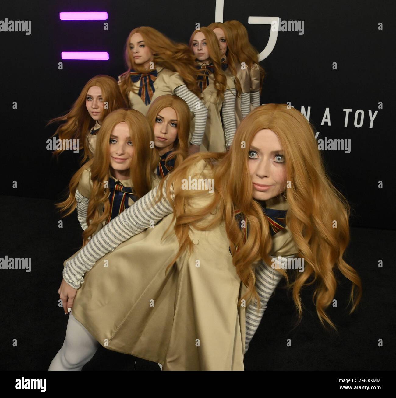 Los Angeles, United States. 07th Dec, 2022. Dancers dressed in the character of the robotic doll in the film, perform on the black carpet during the premiere of the motion picture sci-fi horror thriller M3GAN' at the TCL Theatre in the Hollywood section of Los Angeles on Wednesday, December 7, 2022. Storyline: A robotics engineer at a toy company builds a life-like doll that begins to take on a life of its own. Photo by Jim Ruymen/UPI Credit: UPI/Alamy Live News Stock Photo