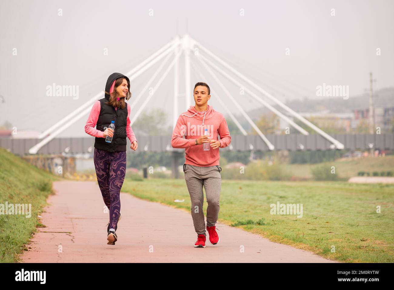 Attractive adn amazing friends are running together and talking to each ...