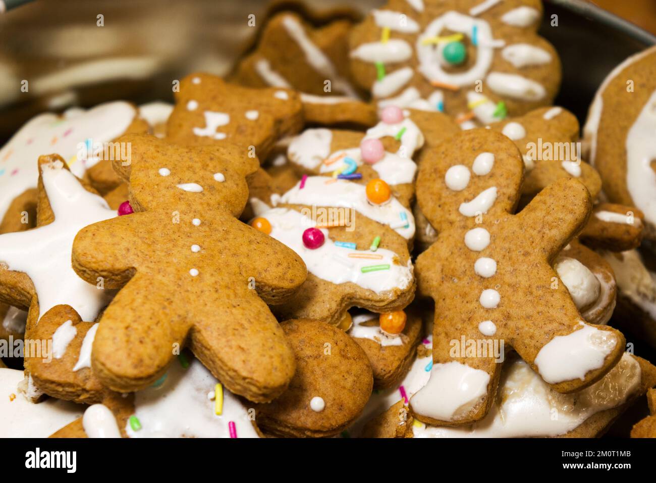 Sweet gingerbread homemade figurines for Christmas decorated with white ...