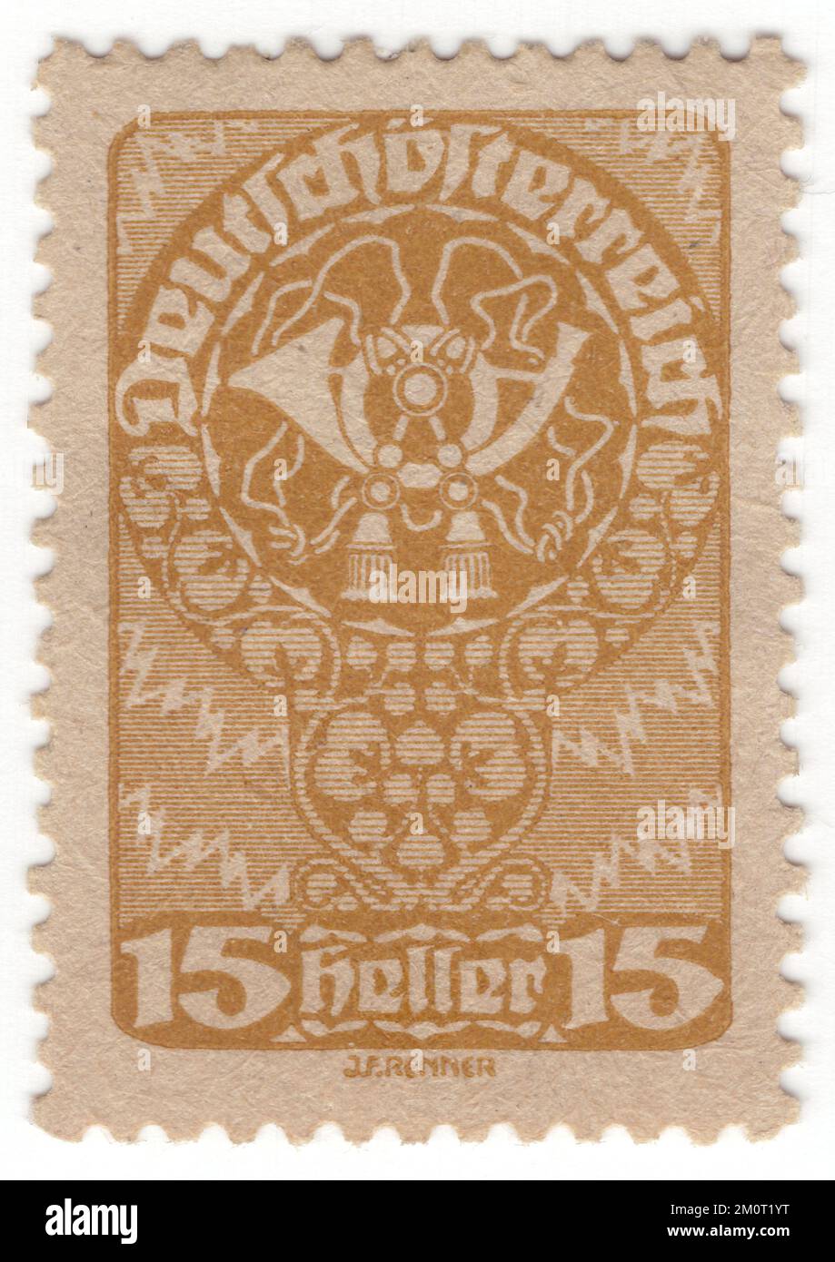 AUSTRIA - 1920: An 15 heller bister postage stamp depicting Post Horn, issue of the Republic. The post horn (also post-horn) is a valveless cylindrical brass instrument with a cupped mouthpiece. The instrument was used to signal the arrival or departure of a post rider or mail coach. It was used especially by postilions of the 18th and 19th centuries Stock Photo