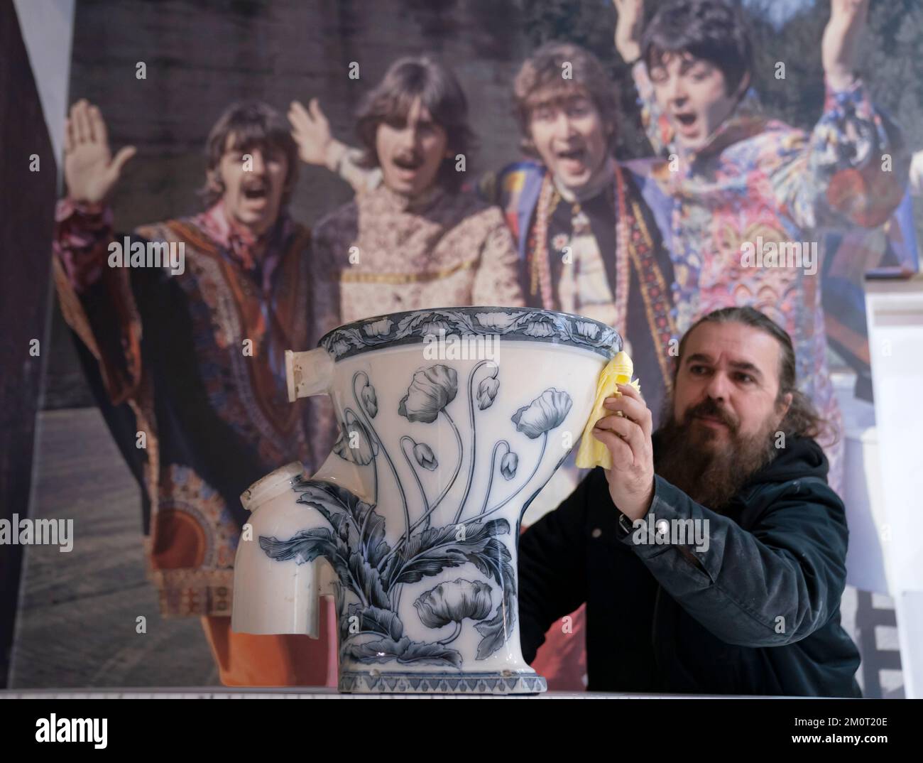 Roag Best gives a final polish to John Lennon's toilet from his ...