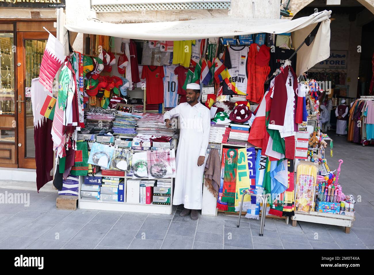 People buy football shirts in Souq Waqif in Doha, Qatar. Picture