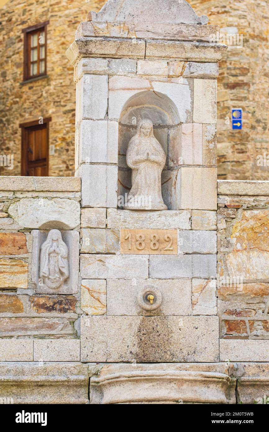 Spain, Galicia, A Fonsagrada, stage on the Camino Primitivo, Spanish pilgrimage route to Santiago de Compostela, sacred fountain (1882) Stock Photo