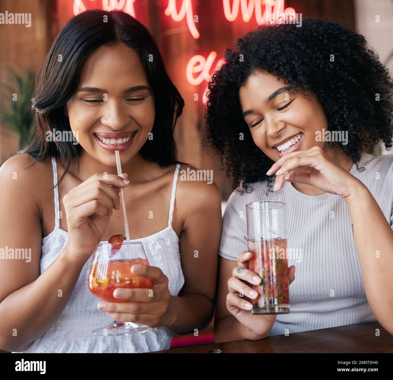 Cocktail, drink and happy hour with black woman friends drinking in a