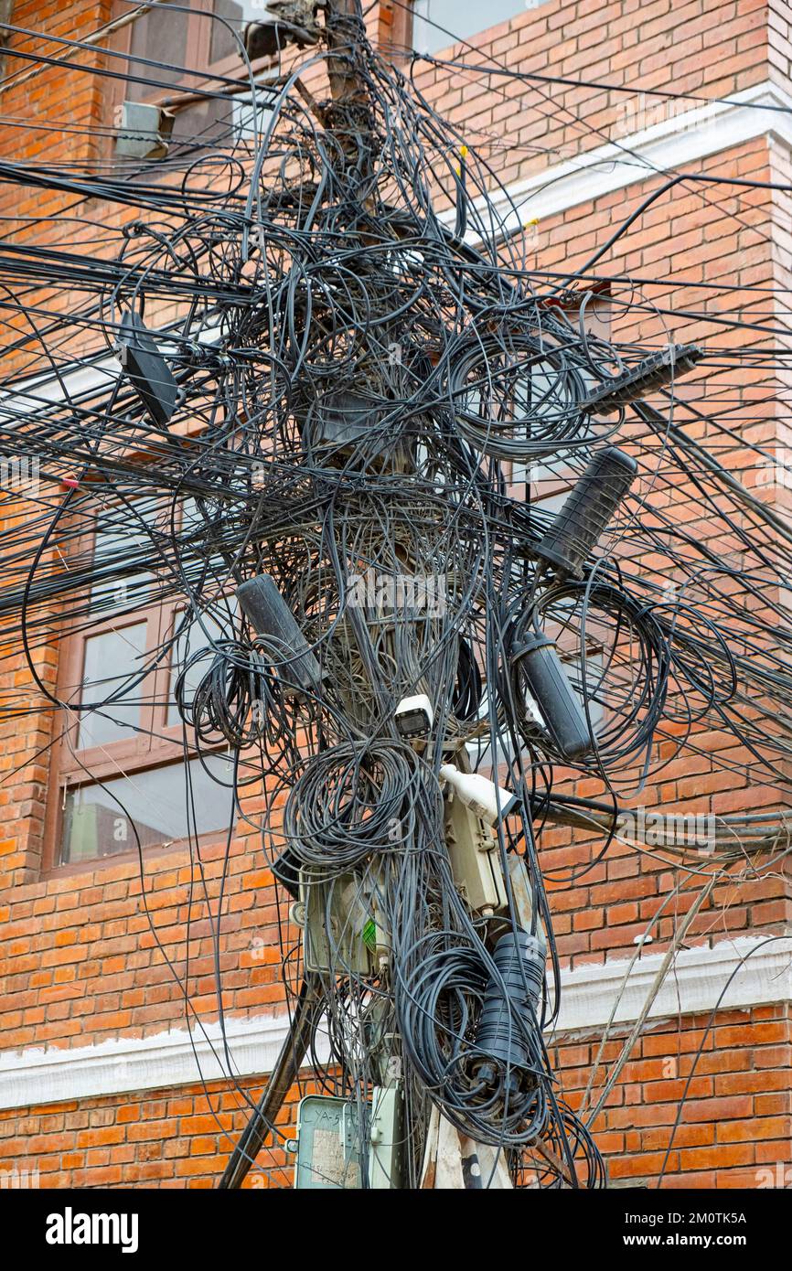 Nepal, Kathmandu valley, Patan, electrical wiring on pylon Stock Photo