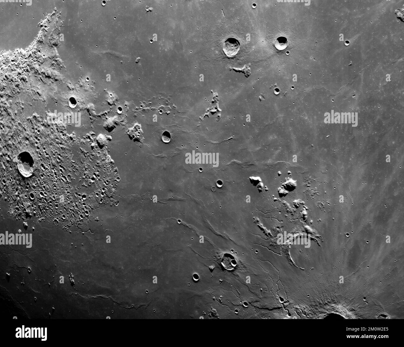 EARTH, THE MOON - 05 December 2022 - Cameras mounted on the crew module of the Orion spacecraft captured these views of the Moon’s surface. On flight Stock Photo