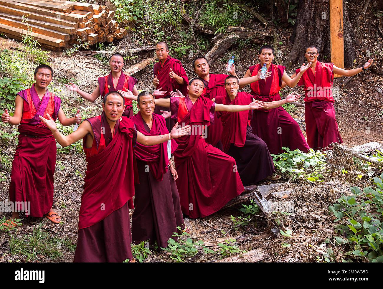 Monks posing  on the Trans Bhutan Trail TBT Stock Photo