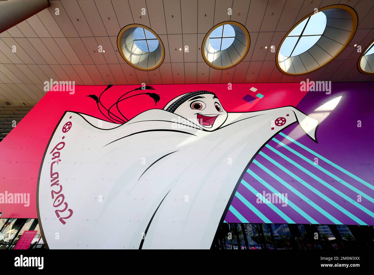 A wall with an image of FIFA World Cup 2022 mascot La'eeb at the Doha Exhibition & Convention Center in Doha, Qatar. Picture date: Thursday December 8, 2022. Stock Photo