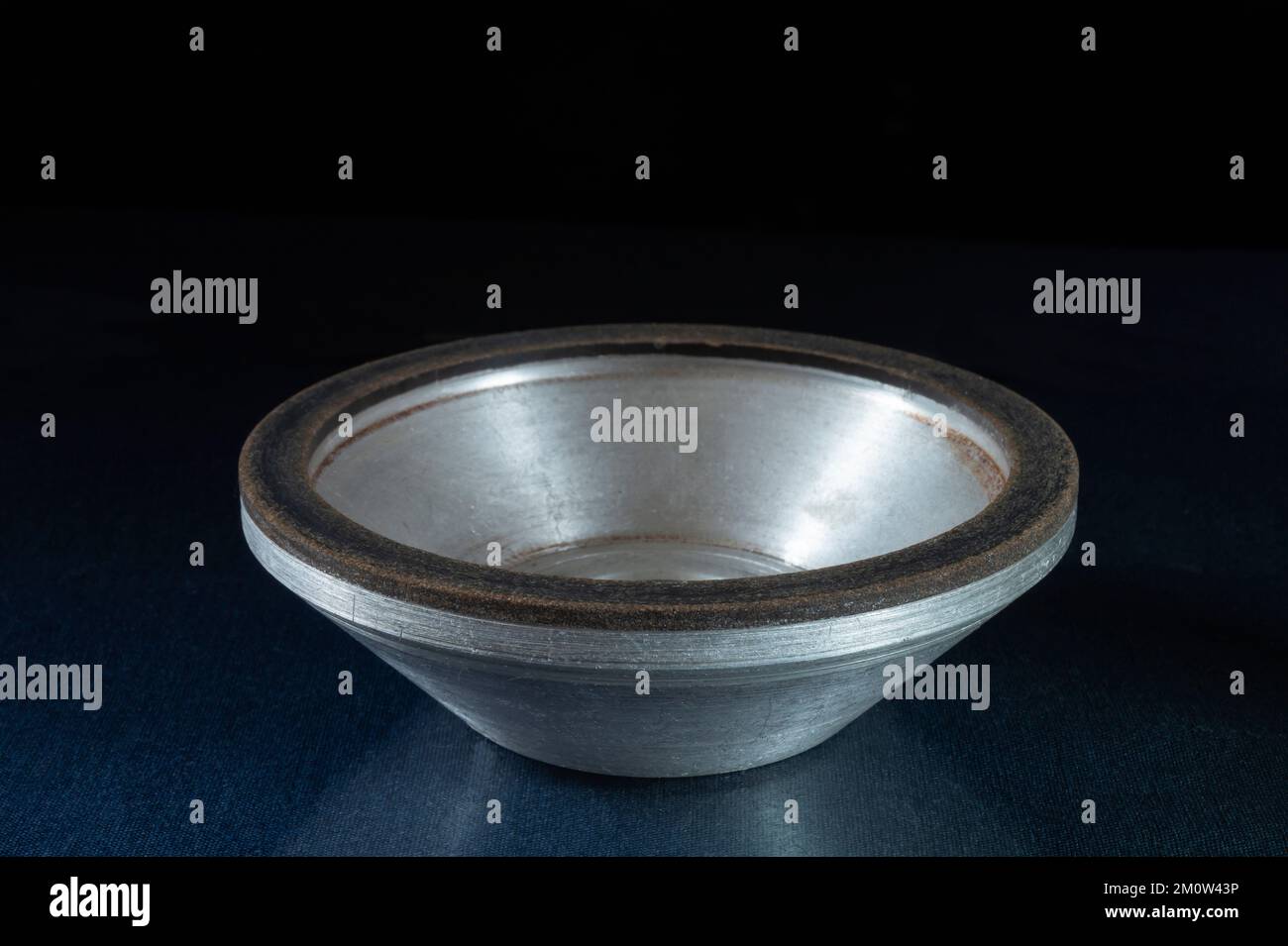 Locksmith tool for grinding Industrial objects on a dark background Stock Photo