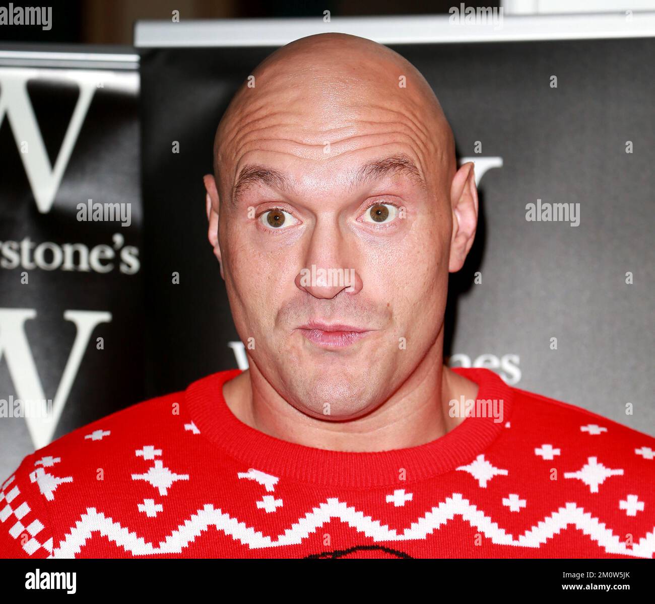 Tyson Fury signs copies of his book "Gloves Off " at Watertstones Leadenhall Market on December