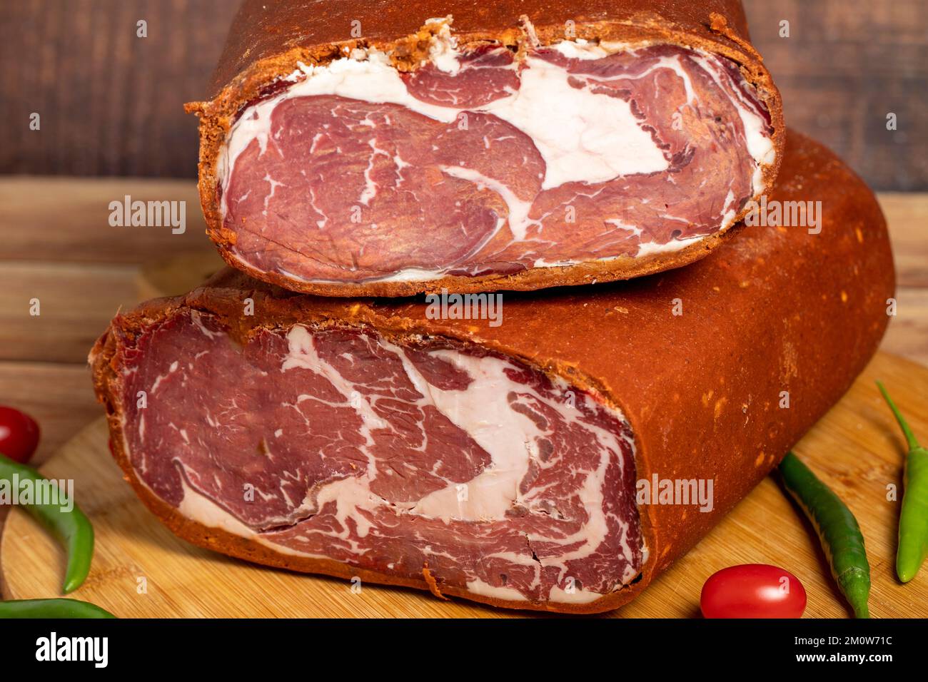 Turkish pastrami on wooden background. Antrikot is bacon made by drying