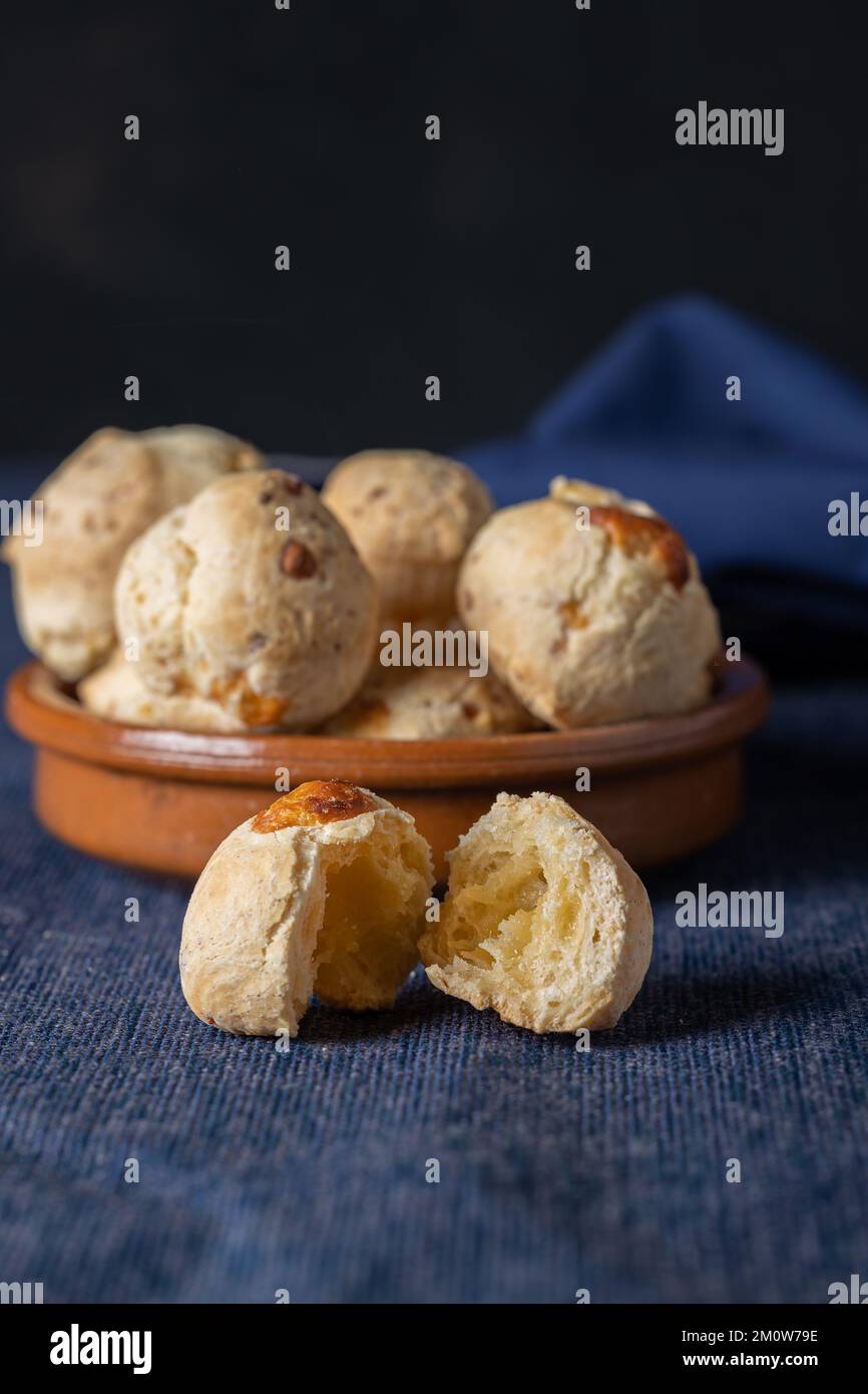 Chipa, typical Paraguayan cheese bread, open to the middle Stock Photo