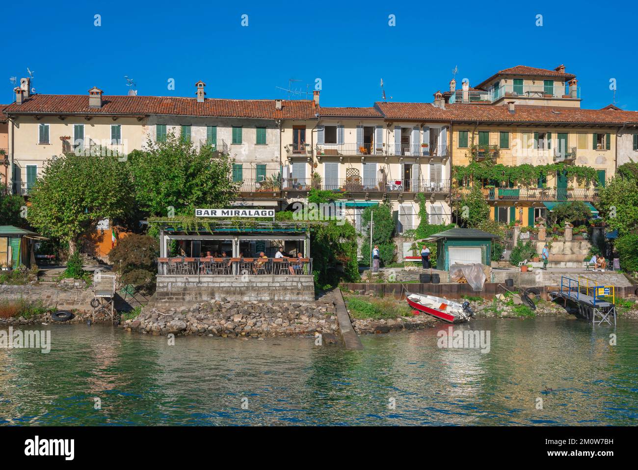 Isola Superiore, view in summer of a waterfront bar on Isola Superiore - or Isola Pescatori (Fishermen's Island) - on Lake Maggiore, Piedmont, Italy Stock Photo
