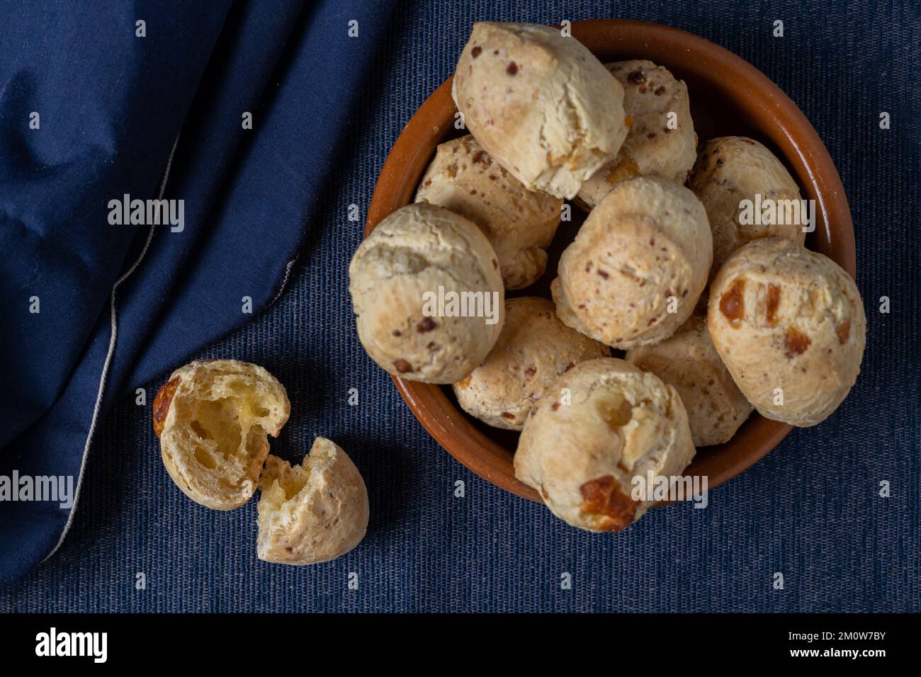 Top view of chipa, typical Paraguayan cheese bread, open to the middle. Stock Photo