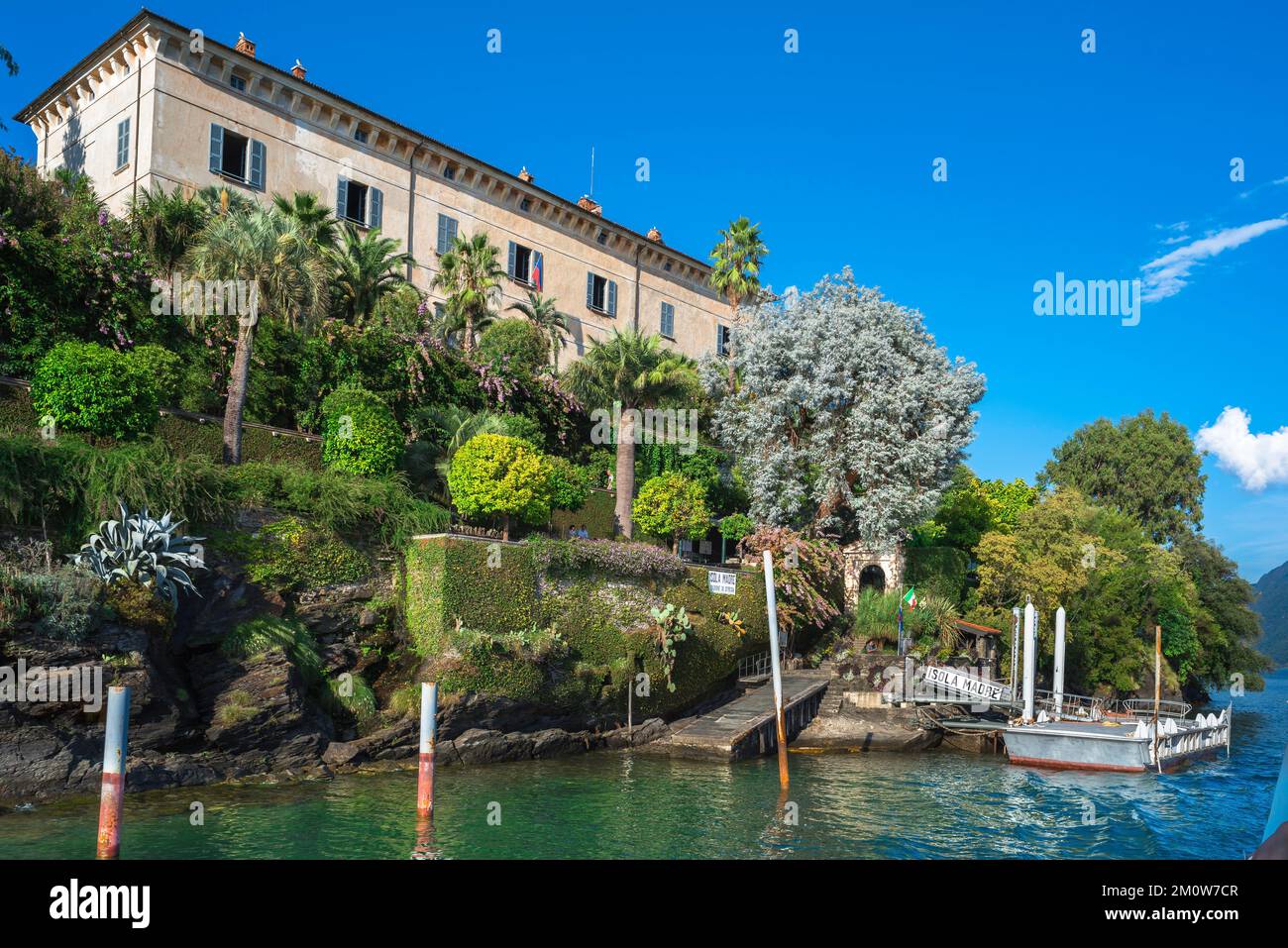 Isola Madre Italy, view in summer of the ferry landing stage below the Palazzo dell Isola Madre, Borromeo Islands, Lake Maggiore, Piedmont Stock Photo