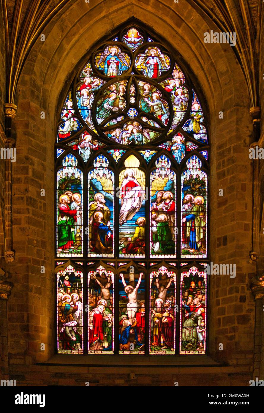 St Giles' Cathedral, Edinburgh - Jesus ascends into heaven in the east window by Ballantine and Son (1877). Stock Photo