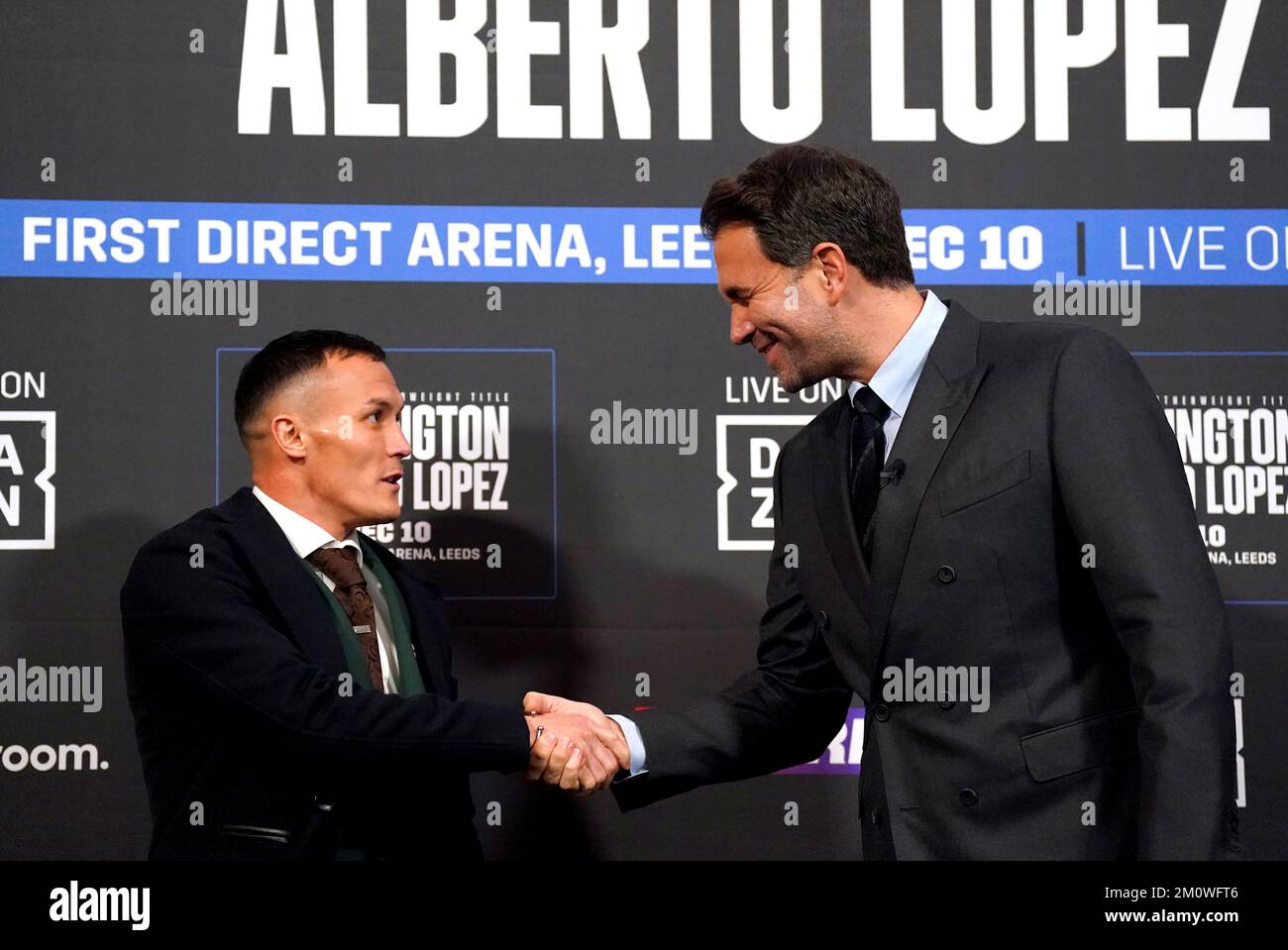 Josh Warrington shakes hands with boxing promoter Eddie Hearn during a press conference at Aspire, Leeds. Picture date: Thursday December 8, 2022. Stock Photo