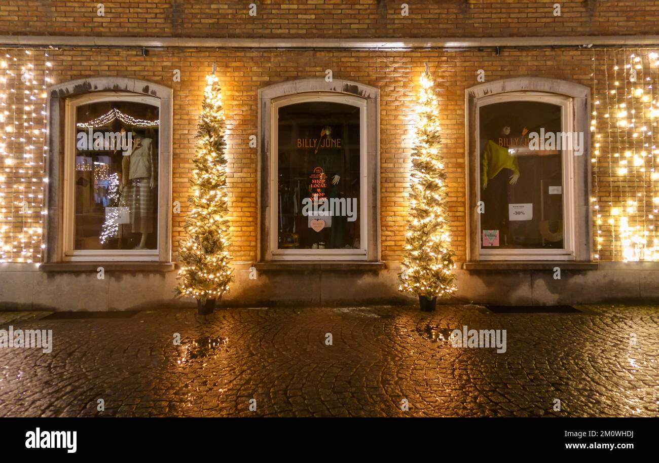 Decorative Christmas lights outside the Billy June fashion outlet for females. Bruges Belgium. November 2022 Stock Photo