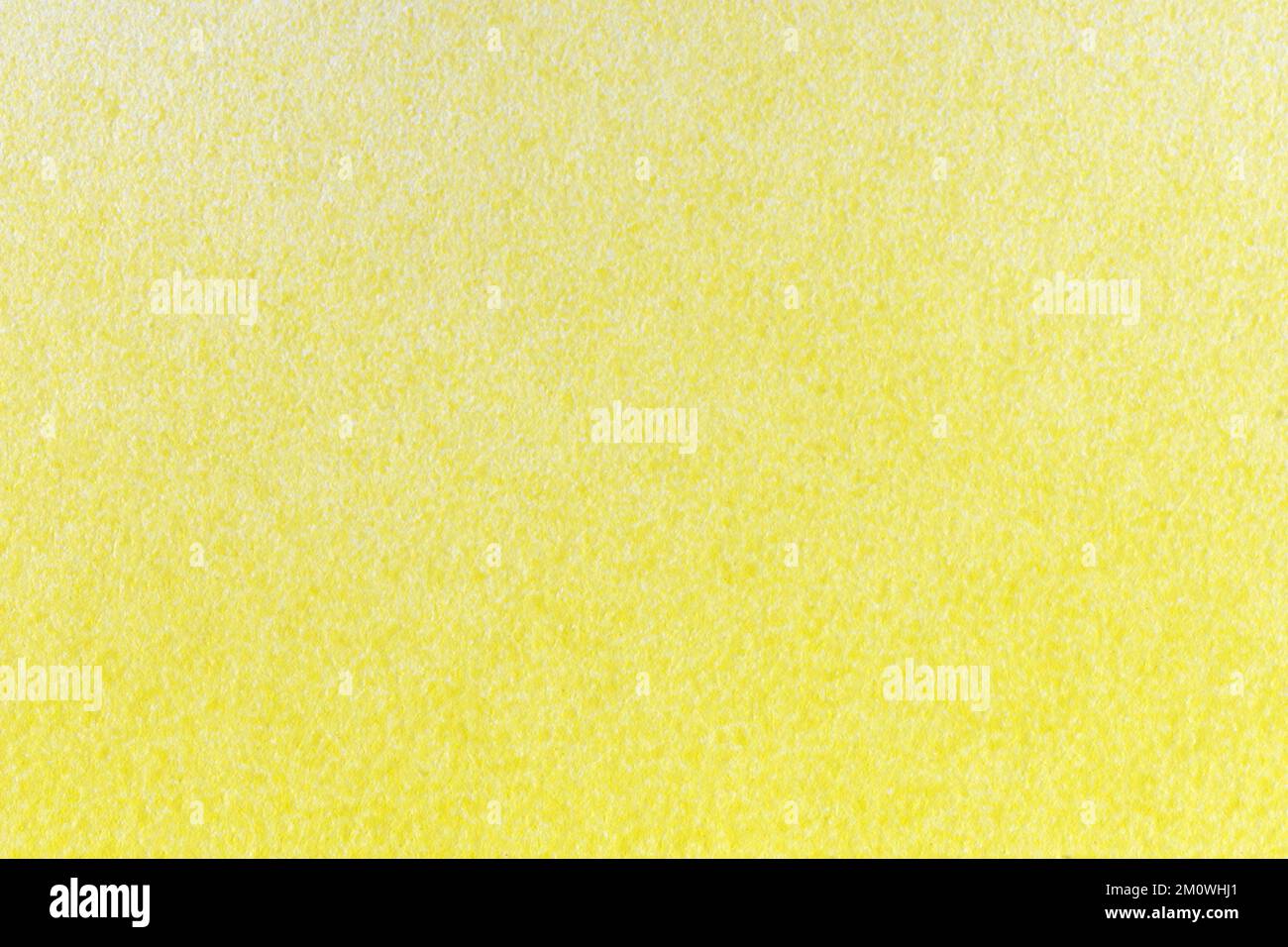 macro photography of yellow spray paint on white paper Stock Photo - Alamy