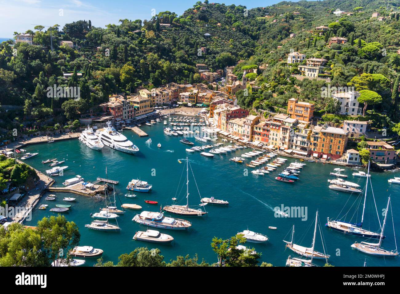 The beautiful harbour of Portofino with it's cluster of properties gathered around a cobbled square. Liguria Northern Italy. September 2022 Stock Photo