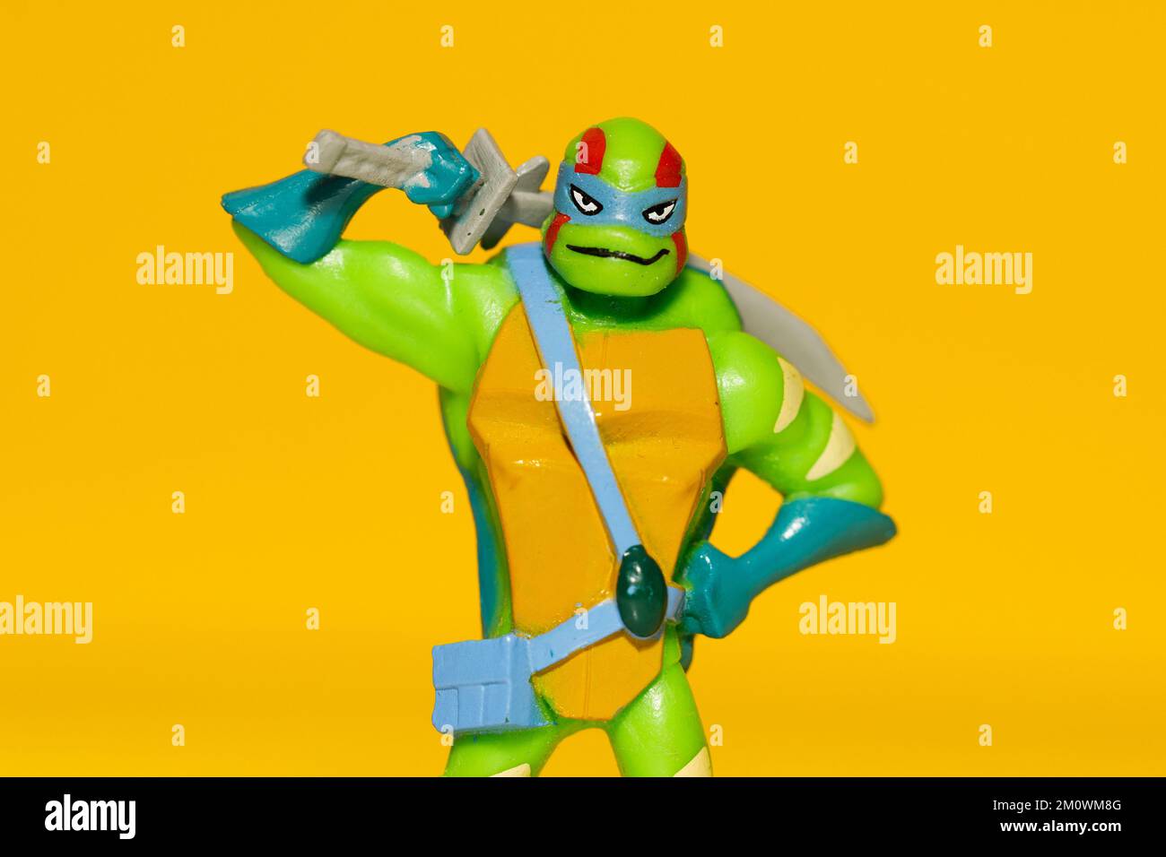 https://c8.alamy.com/comp/2M0WM8G/russia-vyborg-08082022-toy-ninja-turtle-raphael-with-a-sword-on-a-yellow-background-high-quality-photo-2M0WM8G.jpg