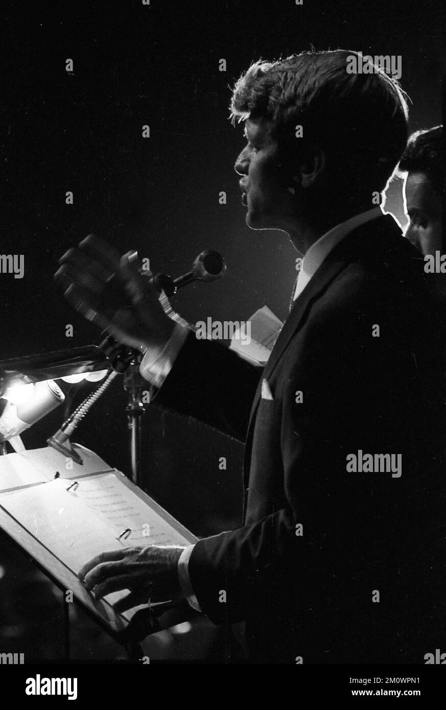 Robert Kennedy, American politician, during a press conference at the