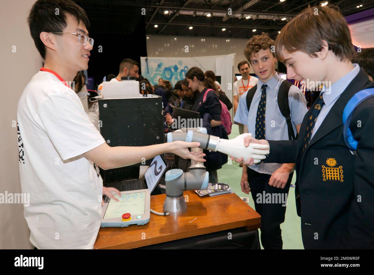 Students interacting with a Robotic Arm, on the King's College London