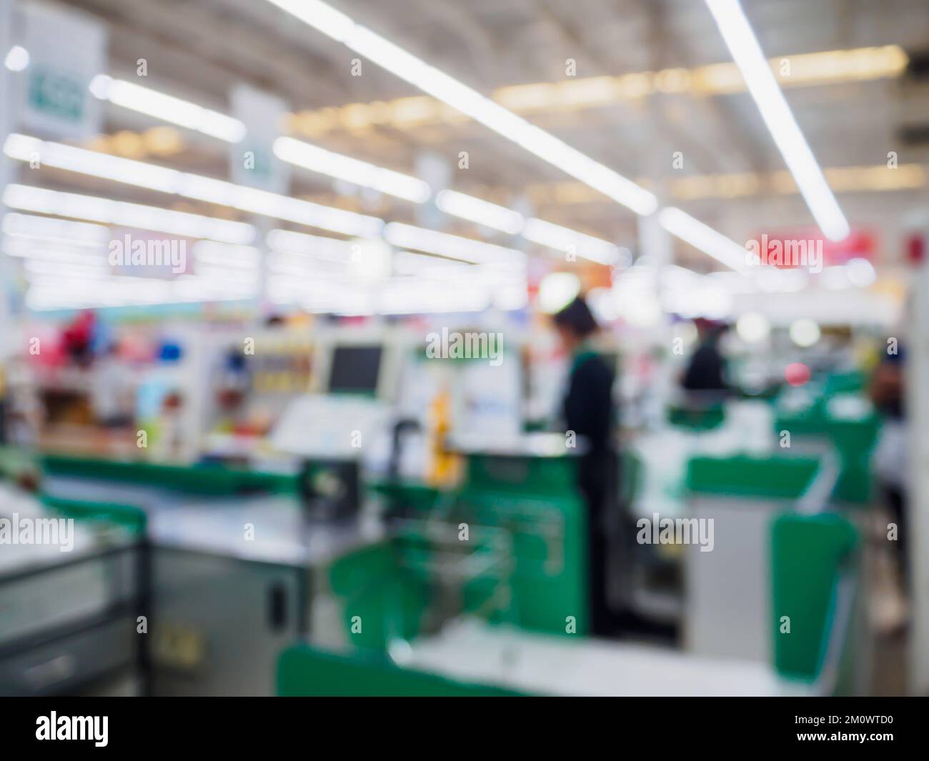supermarket checkout cashier counter in store blurred background Stock